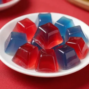 Colorful 4th of July Jello dessert layered in red, white, and blue