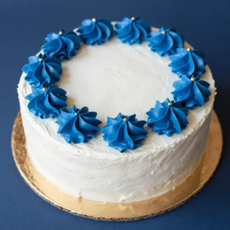 A festive cake decorated with colorful frosting and the words 'Charters Day' written on top.