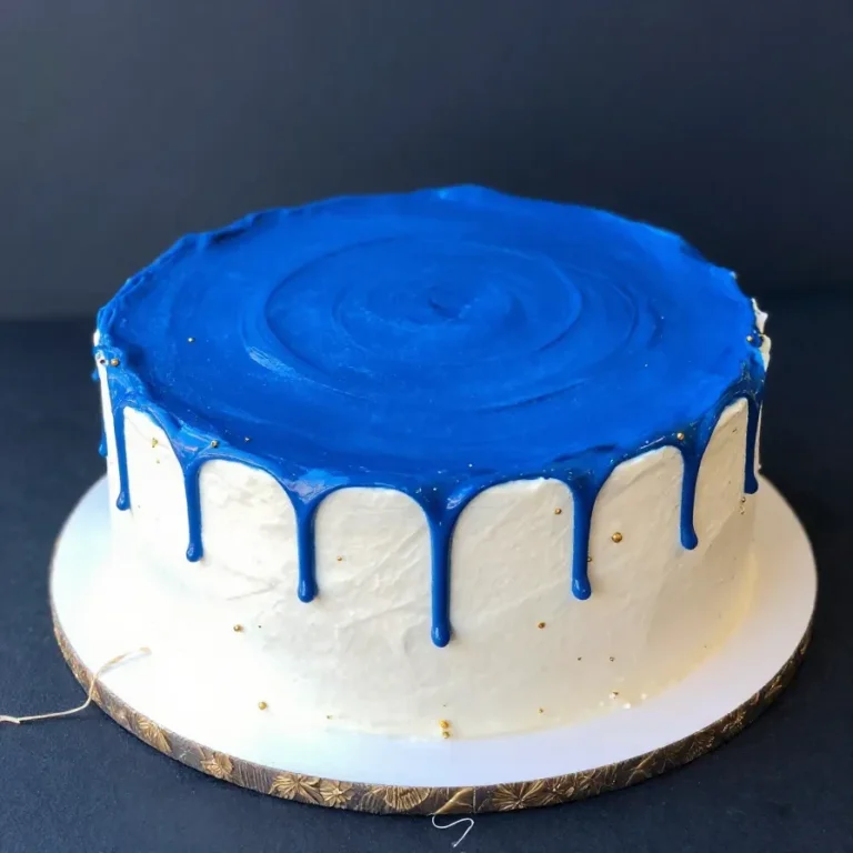 A festive cake decorated for Charters Day celebration with colorful icing and candles.